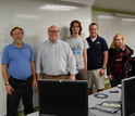 Photo of researchers on the Visual Cortex on Silicon team with three students.